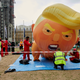 Trump Babysitters inflate a large Trump Baby Blimp in Parliament Square outside Westminster on June 4, 2019 in London, England.